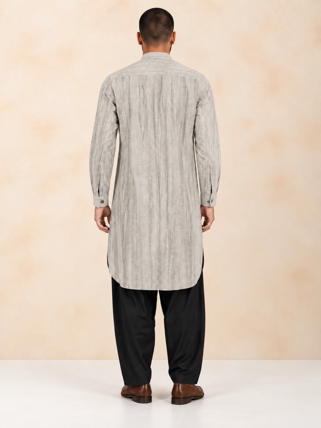 Men's beige smoked linen Pathani with black salwar, back view