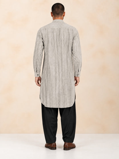 Men's beige smoked linen Pathani with black salwar, back view