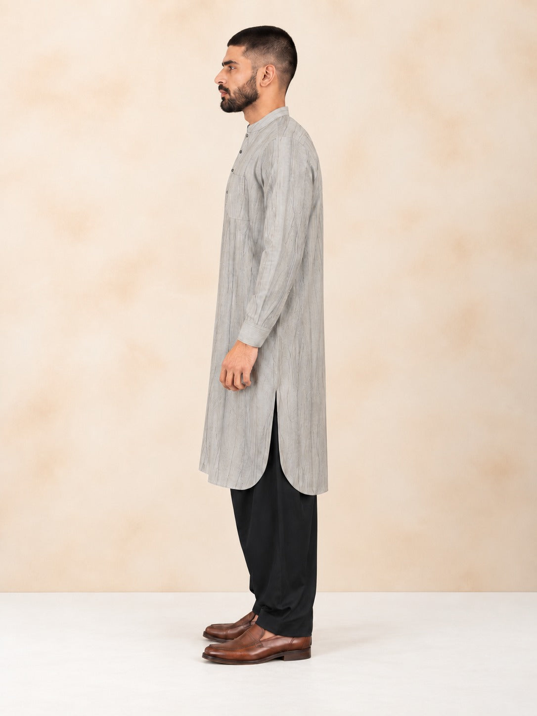 Men's beige smoked linen Pathani with black salwar, side view