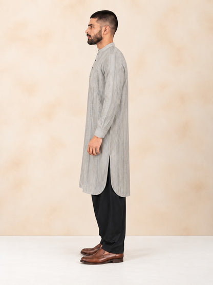 Men's beige smoked linen Pathani with black salwar, side view